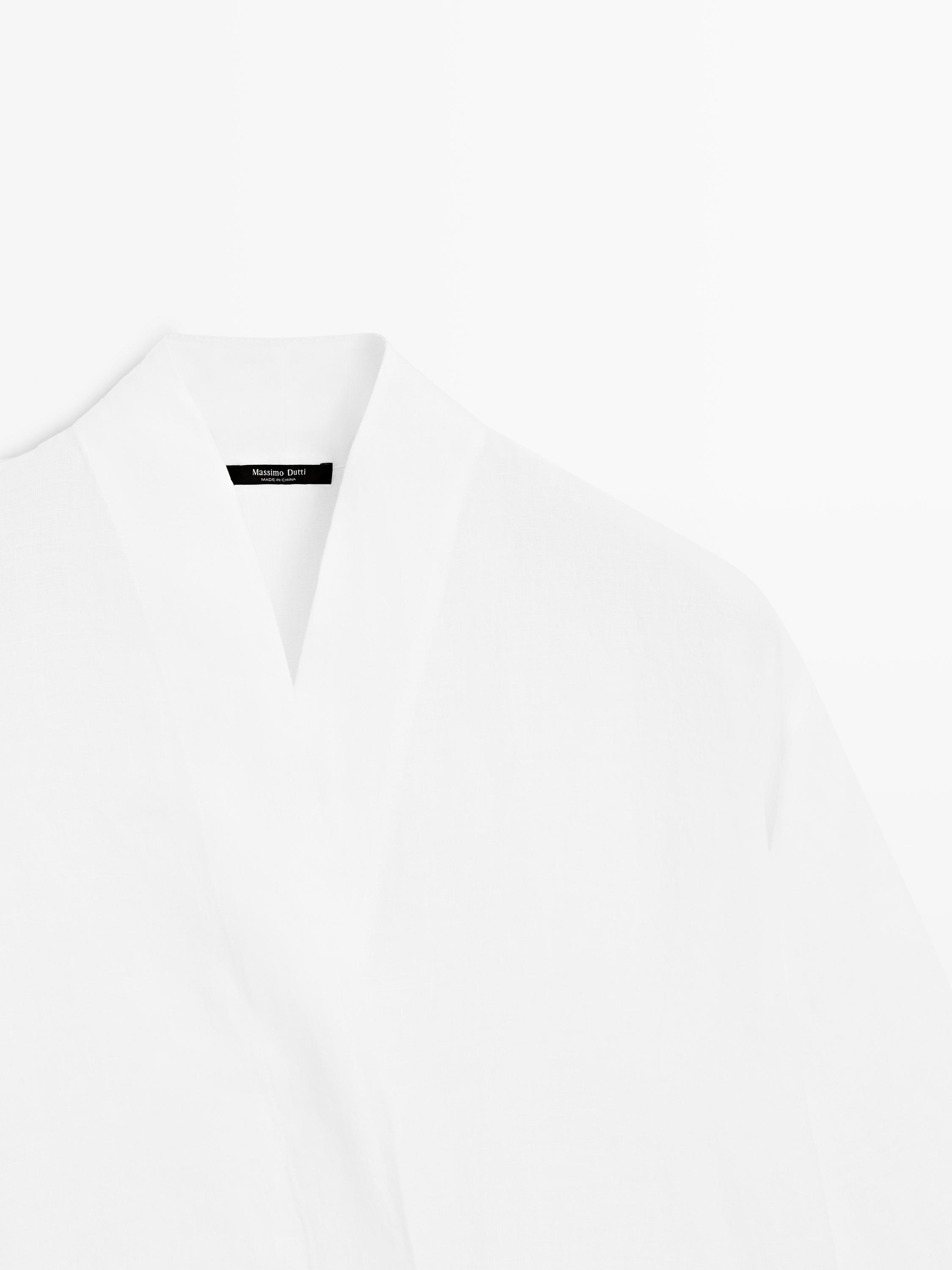 Flowing linen blouse with surplice neckline